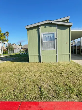 a view of a backyard with a garden