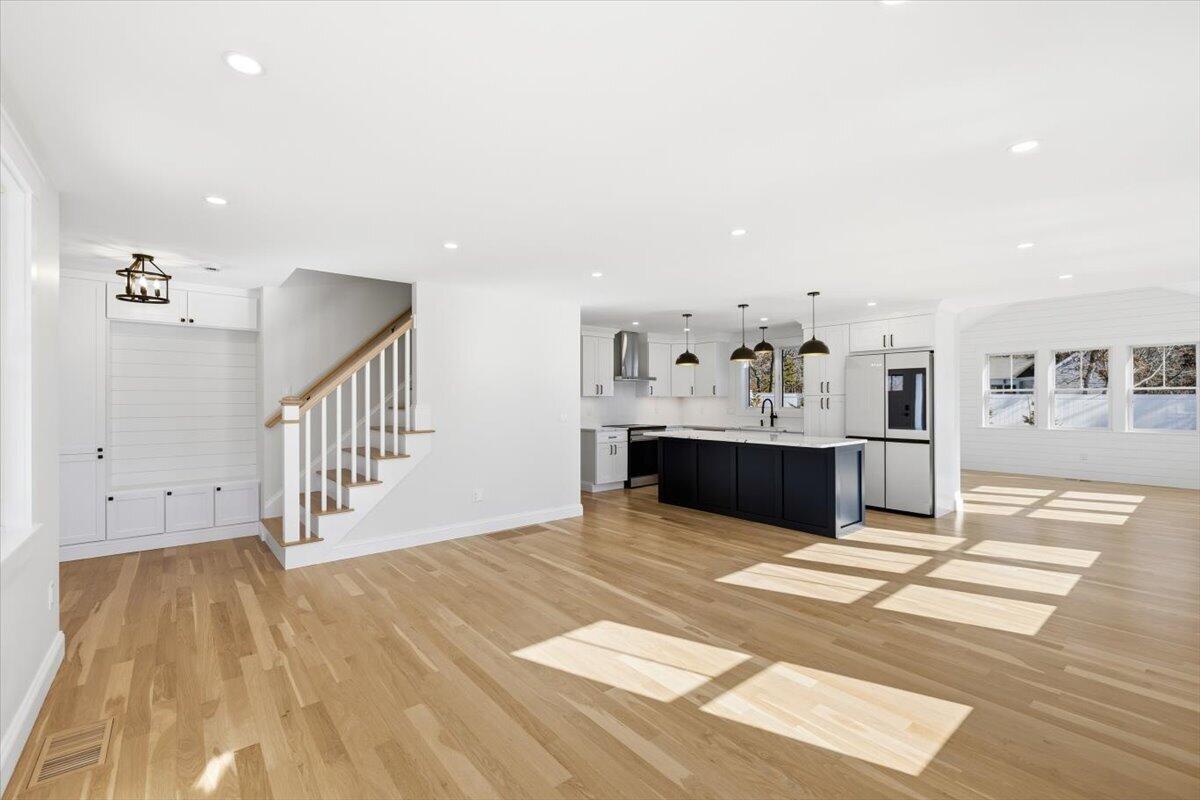 58 Old Chatham Road Brewster, MA 02631 - Photo 19 of 38 a view of kitchen with cabinets and wooden floor