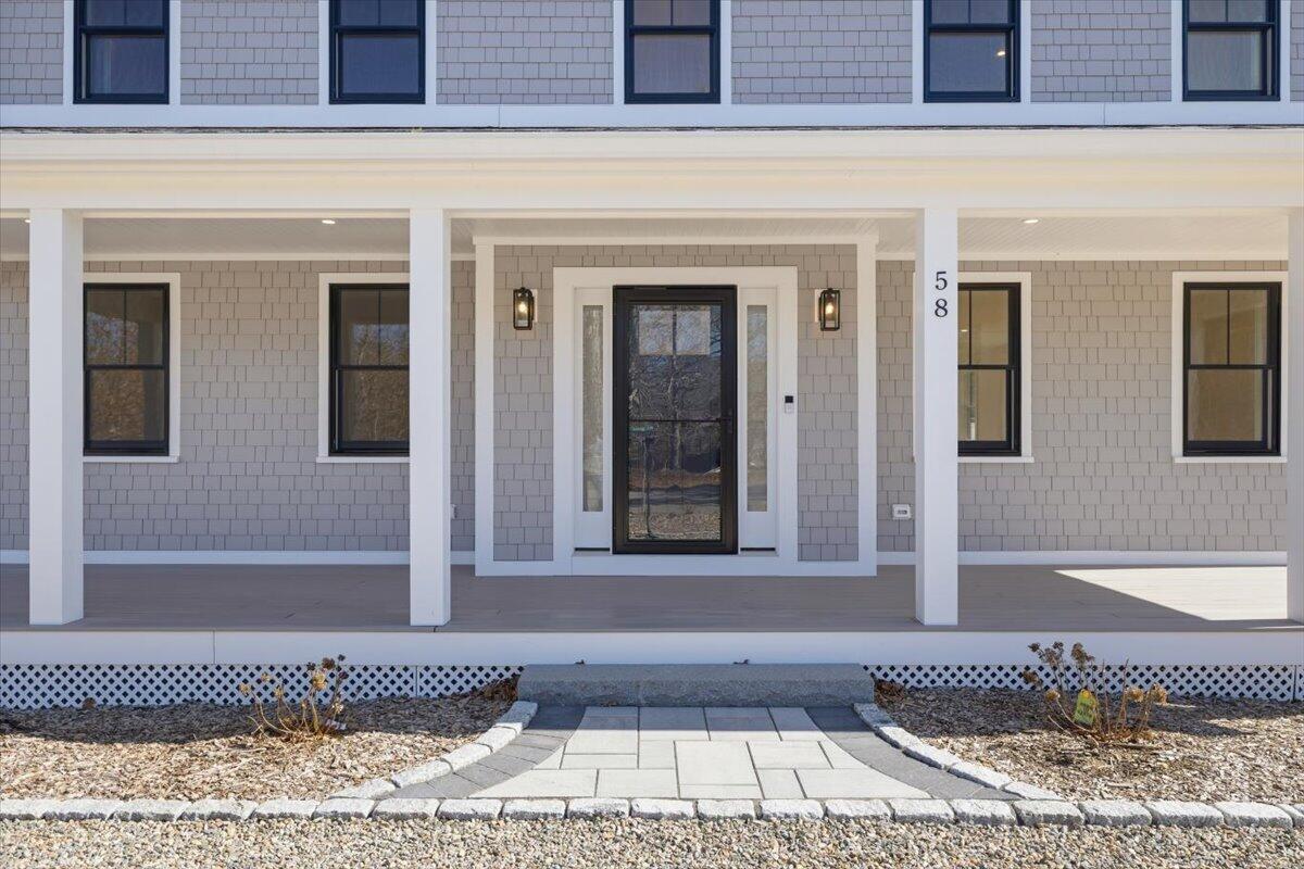 58 Old Chatham Road Brewster, MA 02631 - Photo 3 of 38 a front view of a building
