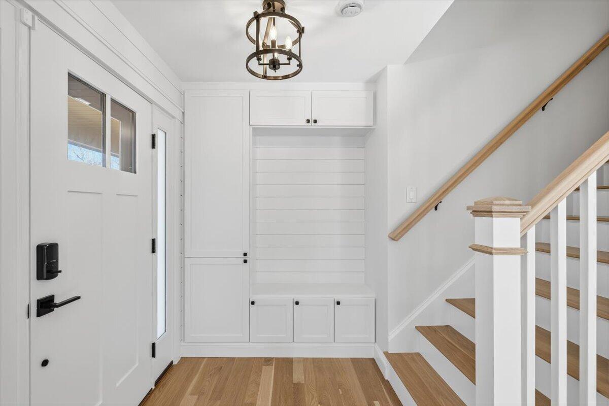 58 Old Chatham Road Brewster, MA 02631 - Photo 4 of 38 a view of an entryway with wooden floor