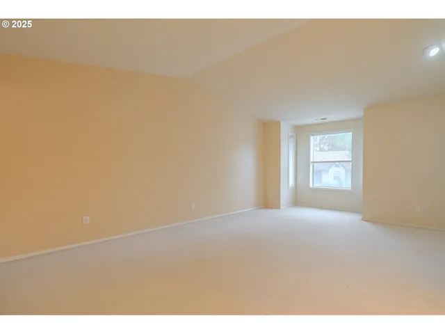 a view of an empty room with window