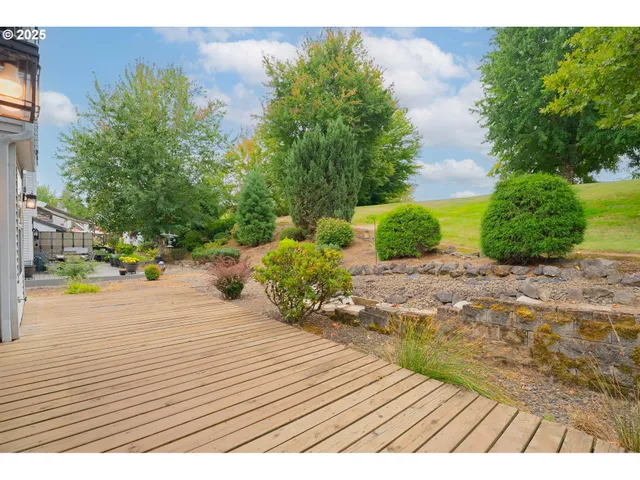 a view of a swimming pool and a yard