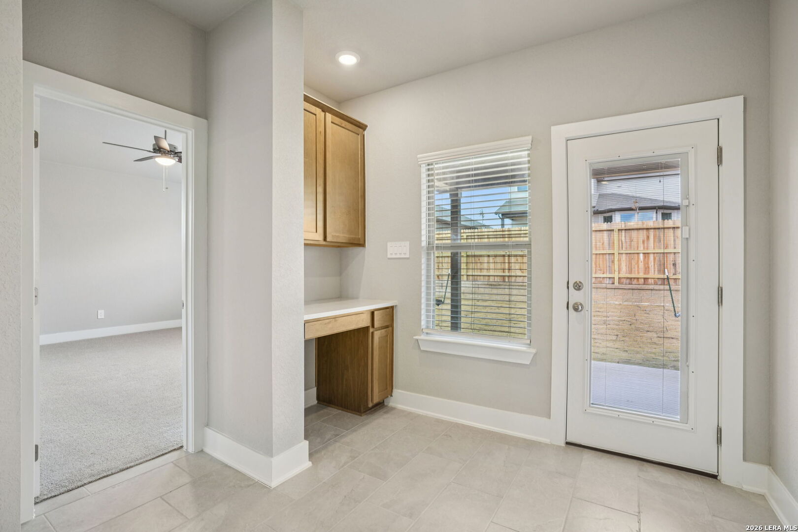 109 Dakota Ridge Cibolo, TX 78108 - Photo 22 of 38 a view of an empty room with a fireplace and a window