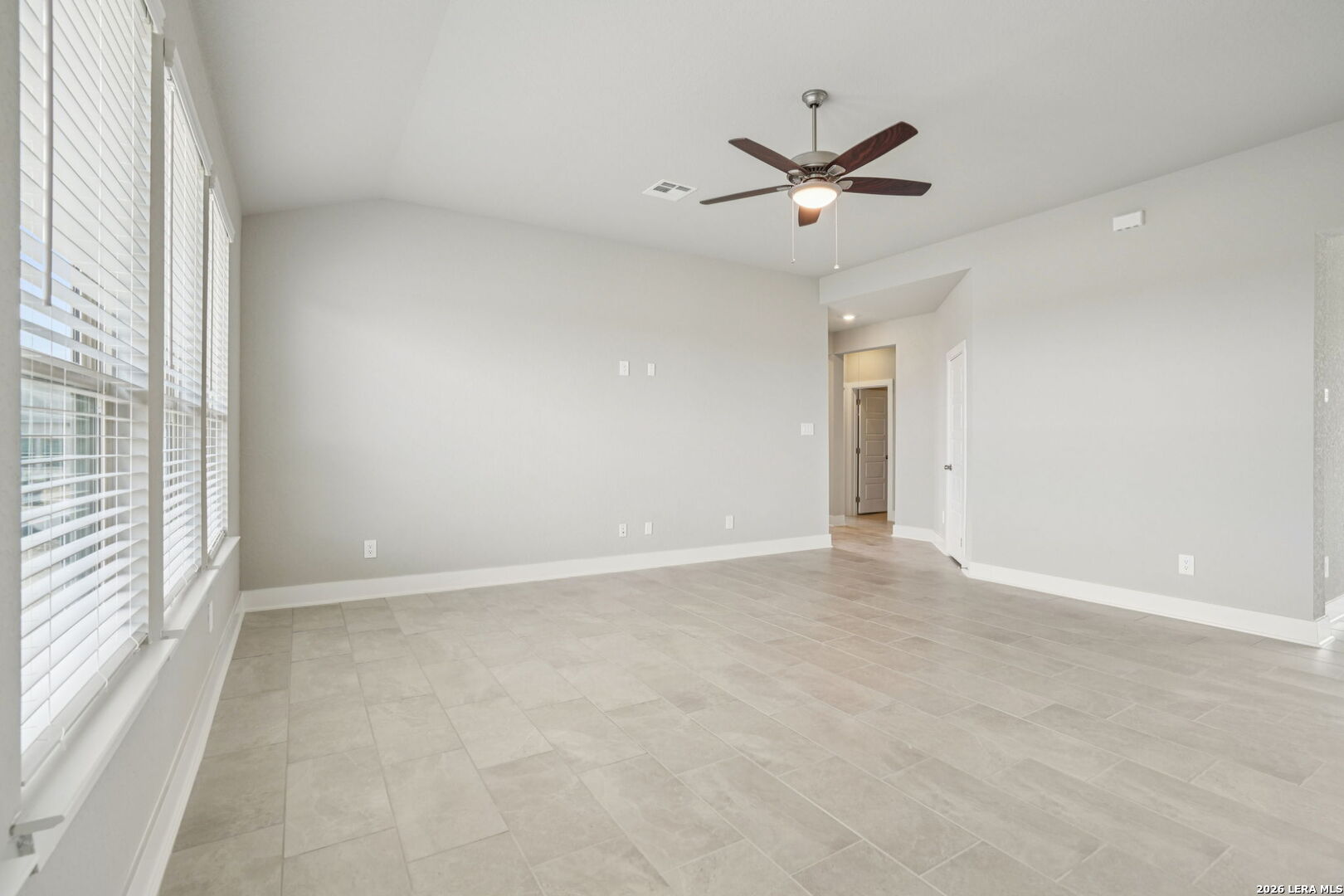 109 Dakota Ridge Cibolo, TX 78108 - Photo 7 of 38 a view of an empty room with a window
