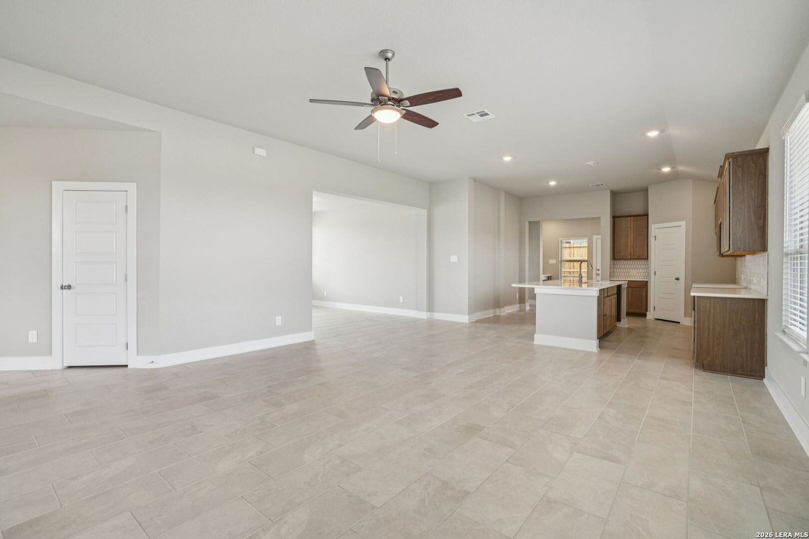 109 Dakota Ridge Cibolo, TX 78108 - Photo 9 of 38 a view of a livingroom with furniture a ceiling fan and window