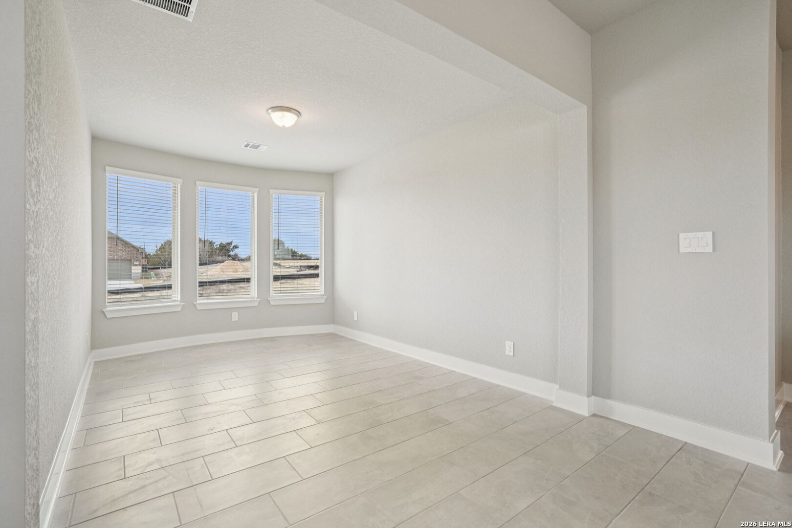 109 Dakota Ridge Cibolo, TX 78108 - Photo 10 of 38 a view of an empty room with a window