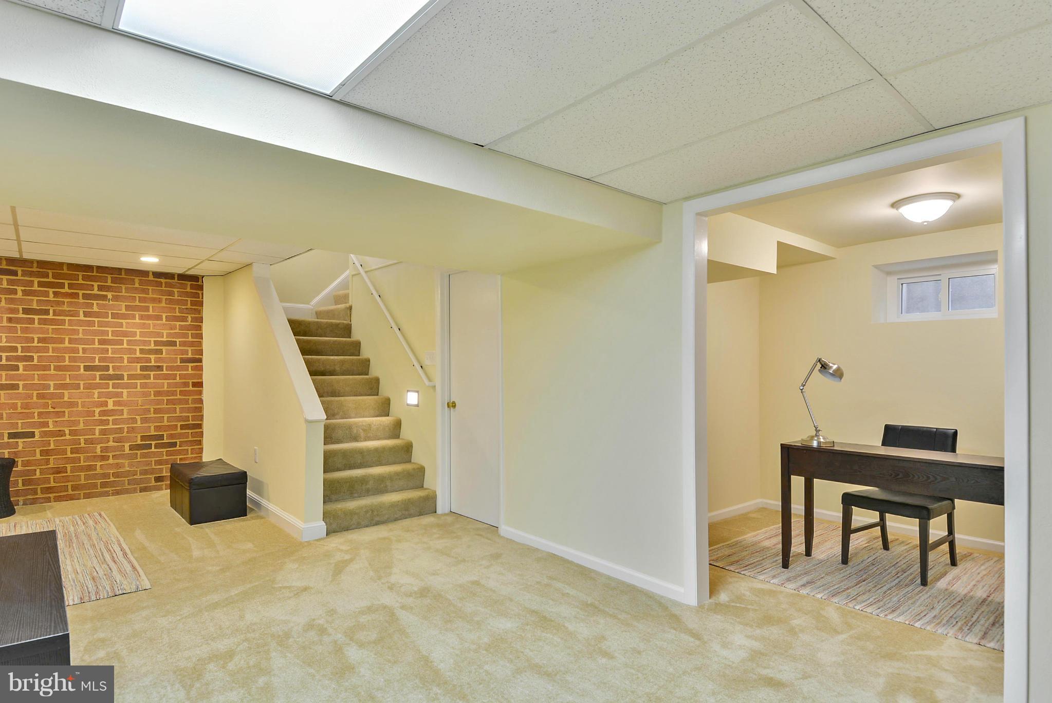619 Greenbrier Drive Silver Spring, MD 20910 - Photo 22 of 30 a view of a livingroom with wooden furniture and entryway