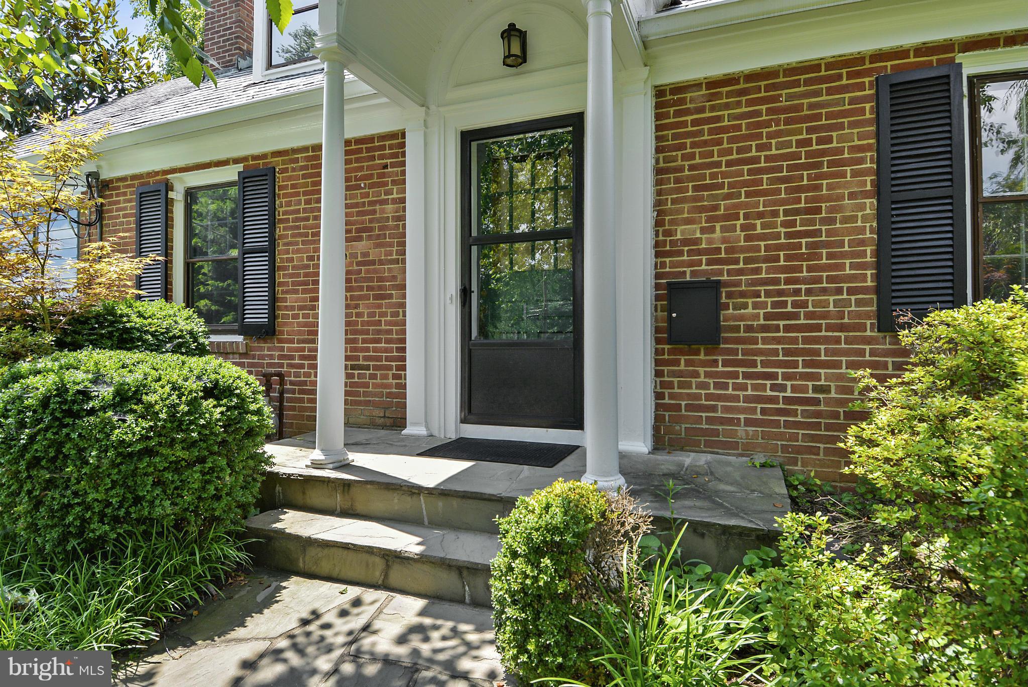 619 Greenbrier Drive Silver Spring, MD 20910 - Photo 29 of 30 a front view of a house with a yard