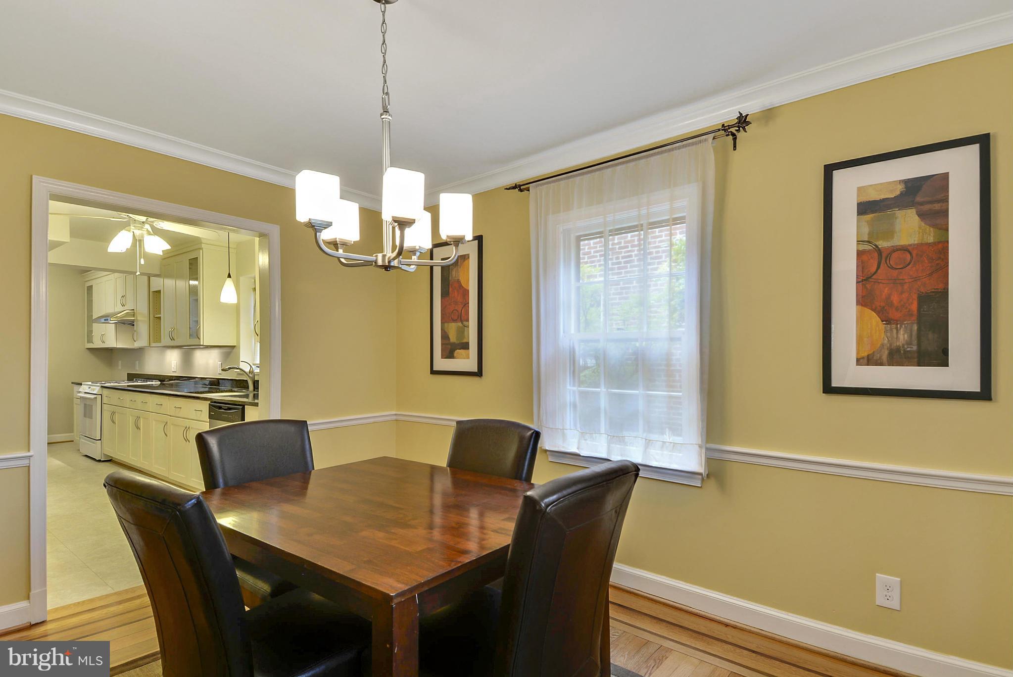 619 Greenbrier Drive Silver Spring, MD 20910 - Photo 6 of 30 a dining room with furniture and window
