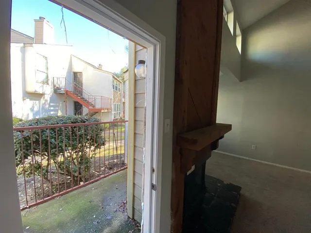 a view of balcony and window