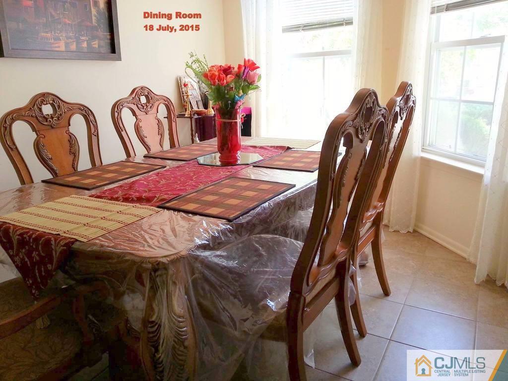 218 Nebula Road Piscataway, NJ 08854 - Photo 5 of 15 a dining room with furniture and window
