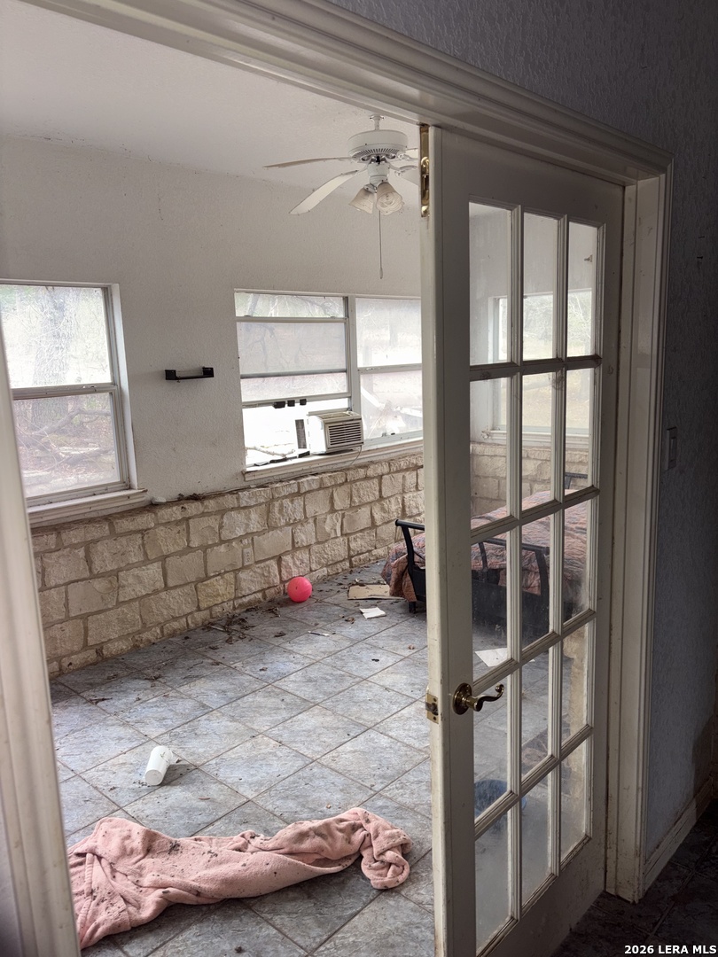 10520 Highway 281 Spring Branch, TX 78070 - Photo 6 of 11 a bathroom with a tub and shower