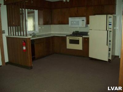 545 Bauer Road Bath, PA 18014 - Photo 6 of 10 a kitchen with a sink and cabinets