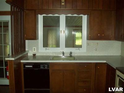 545 Bauer Road Bath, PA 18014 - Photo 7 of 10 a bathroom with a sink and a mirror