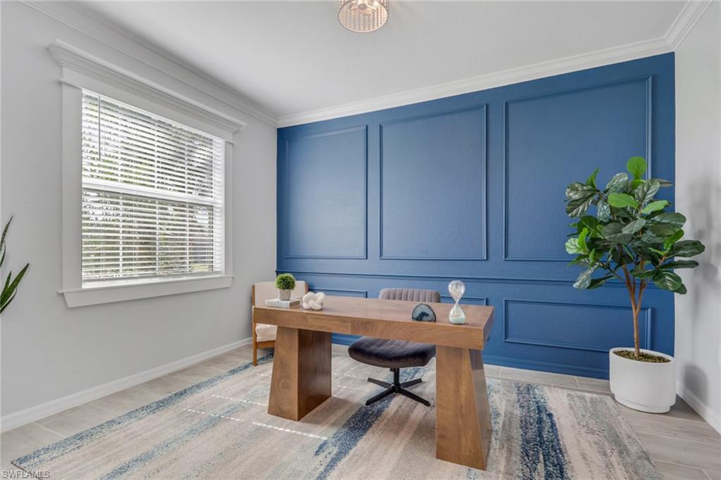2187 Cara Cara Way Naples, FL 34120 - Photo 13 of 50 Office with a decorative wall, light wood-style flooring, and crown molding