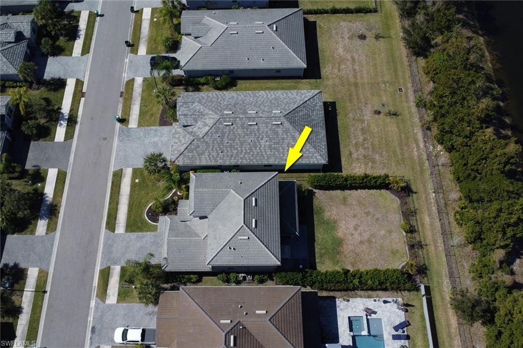 2187 Cara Cara Way Naples, FL 34120 - Photo 29 of 50 Aerial view of residential area