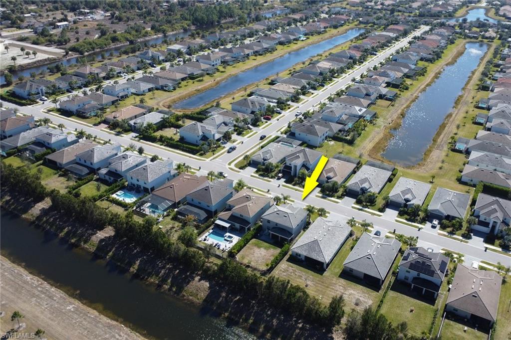 2187 Cara Cara Way Naples, FL 34120 - Photo 30 of 50 View of property location featuring a large body of water and nearby suburban area