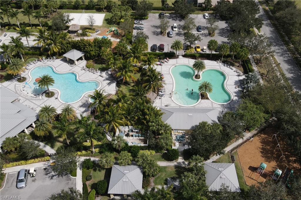 2187 Cara Cara Way Naples, FL 34120 - Photo 39 of 48 Aerial view of a pool