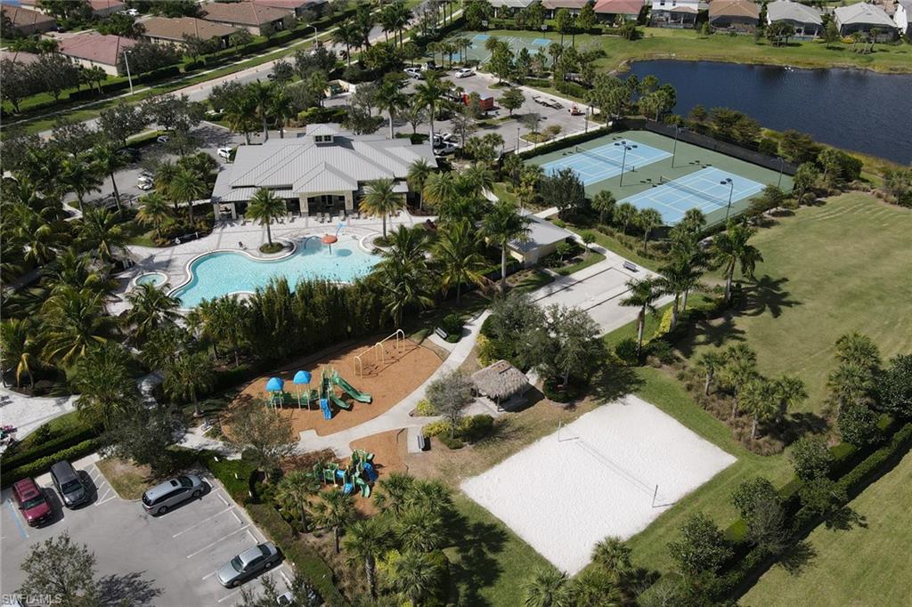 2187 Cara Cara Way Naples, FL 34120 - Photo 40 of 48 Aerial perspective of suburban area featuring a nearby body of water