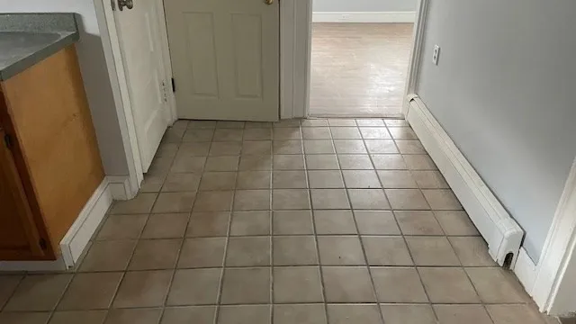 a view of empty room with windows