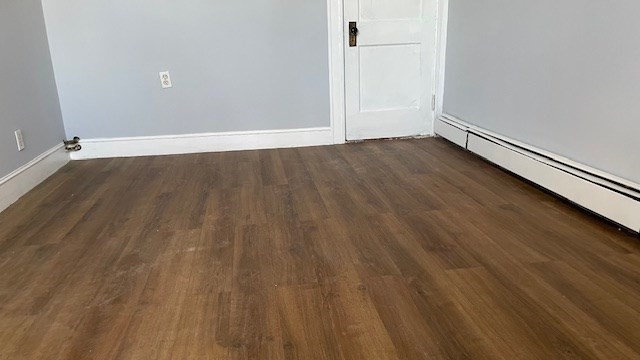 58 Federal Avenue, Unit 2 Quincy, MA 02169 - Photo 3 of 10 a view of an empty room with wooden floor