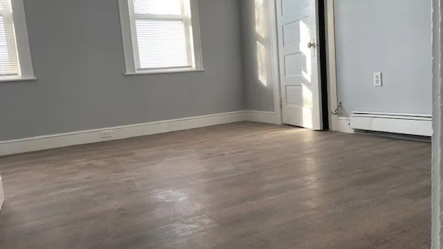 an empty room with windows