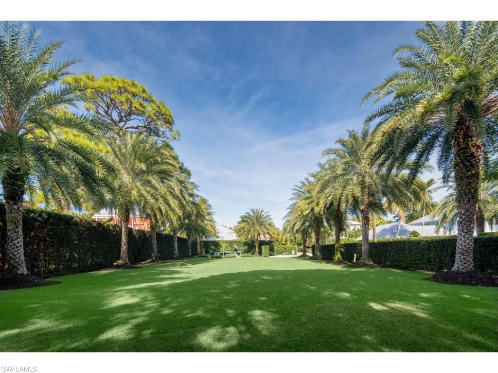 247 6th Street North Naples, FL 34102 - Photo 3 of 30 a view of a park with a palm tree