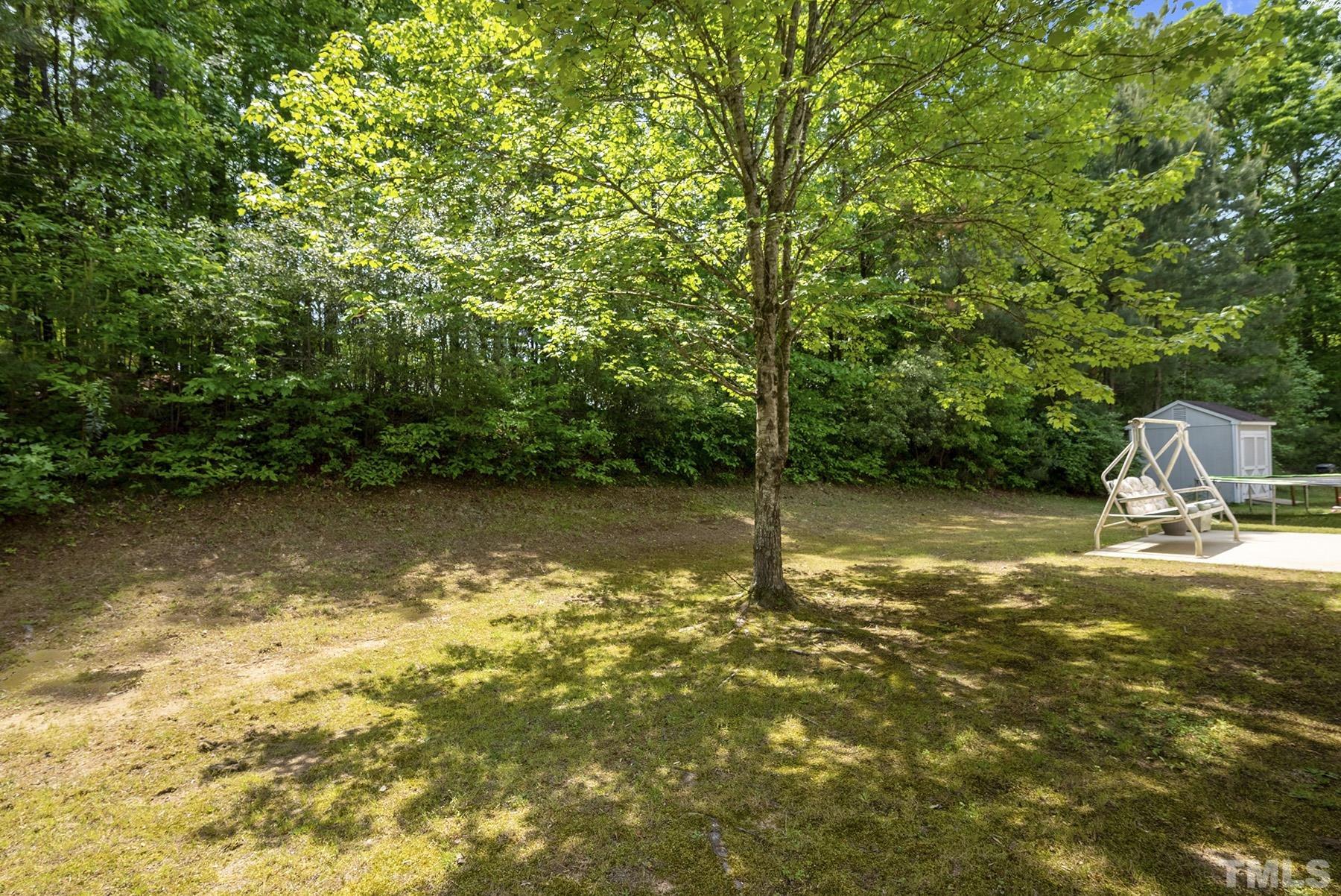 5712 Forest Point Road Raleigh, NC 27610 - Photo 5 of 23 a view of a lake view
