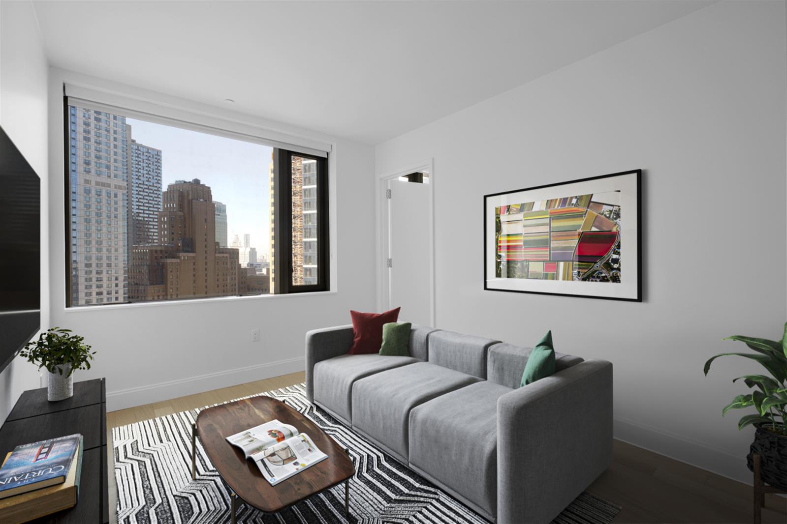 10 City Point, Unit 29B Brooklyn, NY 11201 - Photo 1 of 25 a living room with furniture and a window