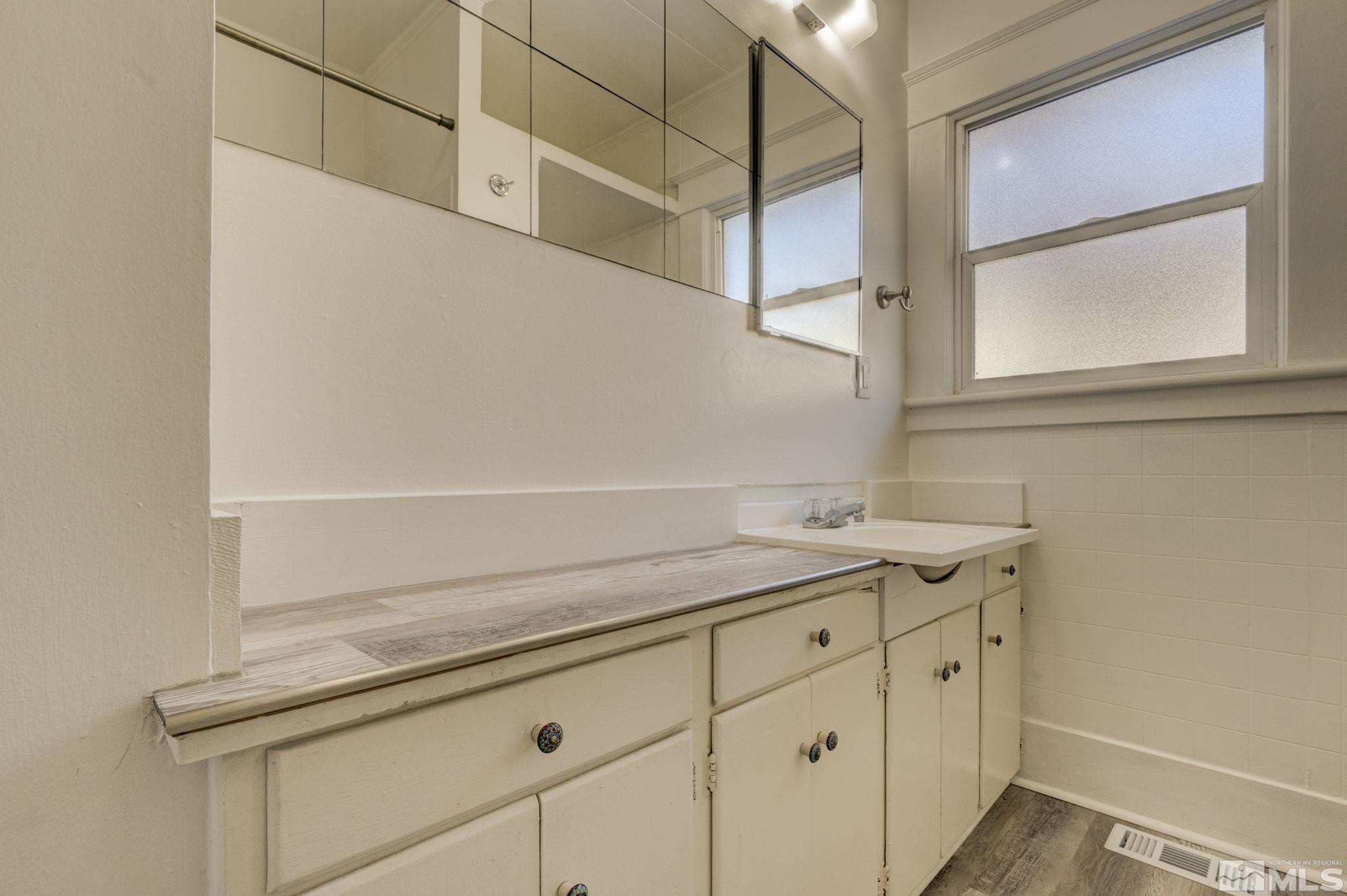 1102 Codel Way Reno, NV 89503 - Photo 11 of 33 a view of a utility room with cabinets