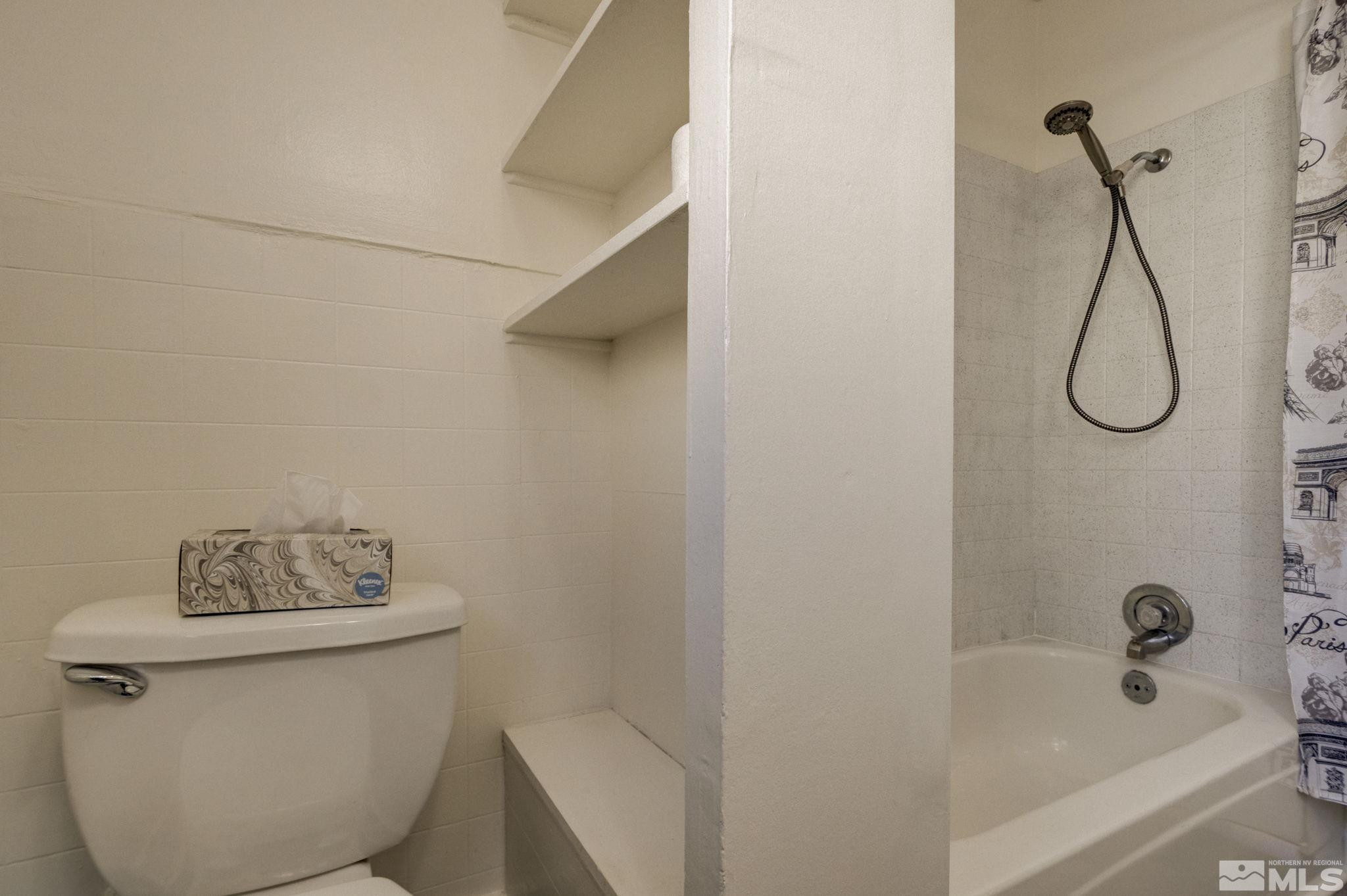 1102 Codel Way Reno, NV 89503 - Photo 12 of 33 a bathroom with a shower and a toilet