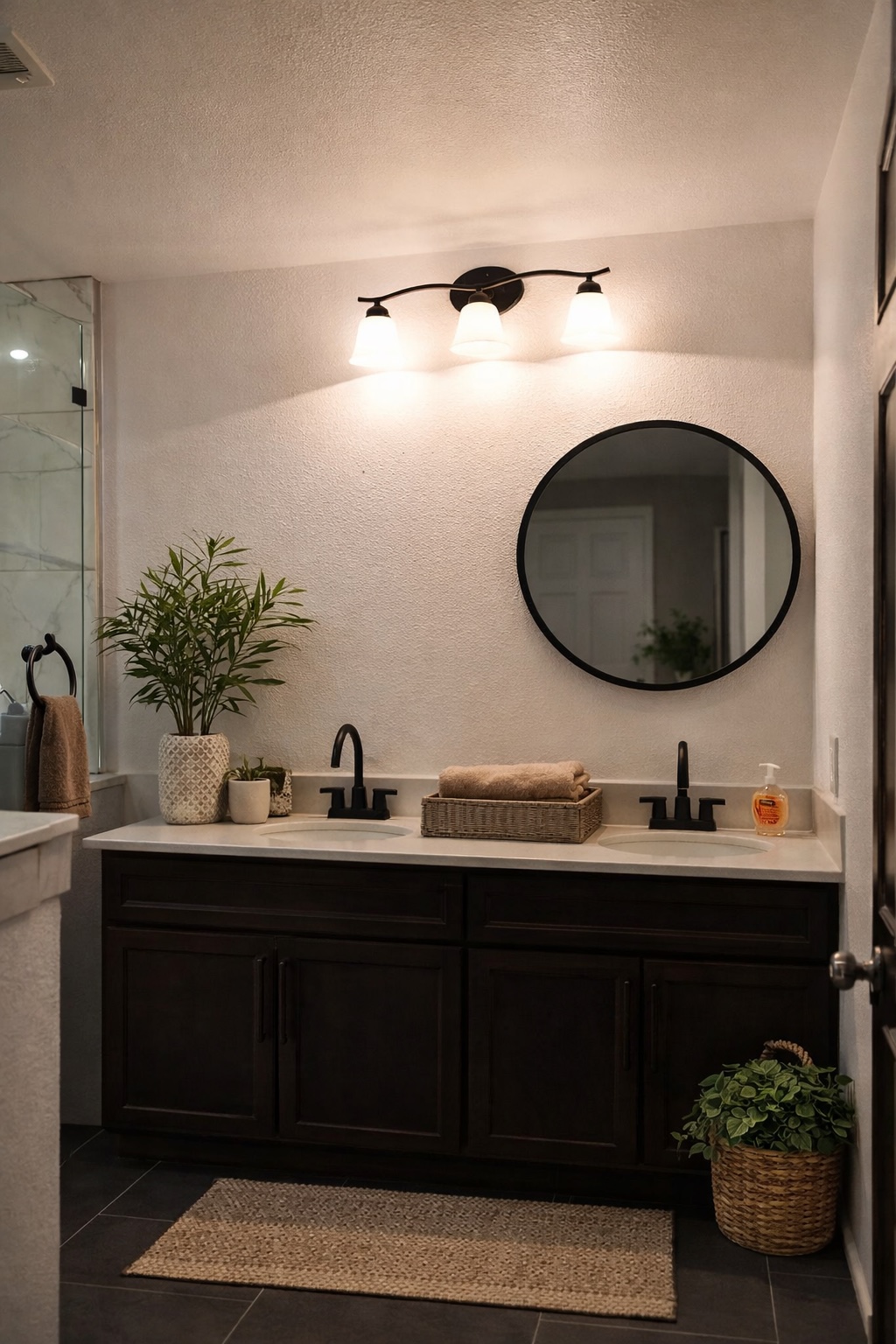 991 Kovar Road, Unit D Flatonia, TX 78941 - Photo 15 of 15 AI used to add decor - Full bath with dark tile patterned floors, double vanity, a textured wall, and a textured ceiling