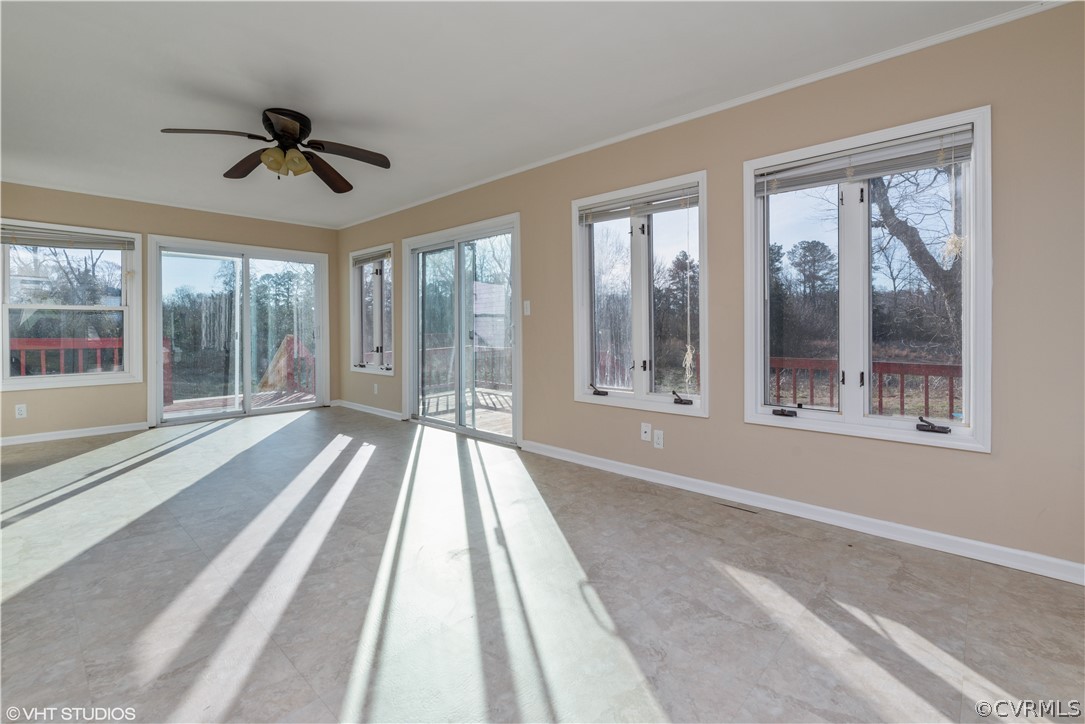 8329 Peaks Road Hanover, VA 23069 - Photo 18 of 25 a view of a room with wooden floor and windows