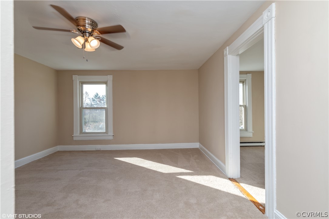 8329 Peaks Road Hanover, VA 23069 - Photo 21 of 25 wooden floor in an empty room with a window