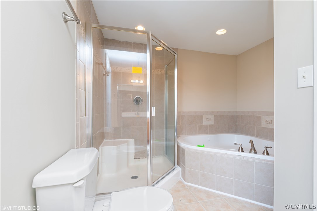 8329 Peaks Road Hanover, VA 23069 - Photo 24 of 25 a bathroom with a bathtub toilet and shower