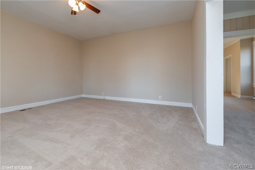 8329 Peaks Road Hanover, VA 23069 - Photo 3 of 25 an empty room with a empty space and chandelier fan