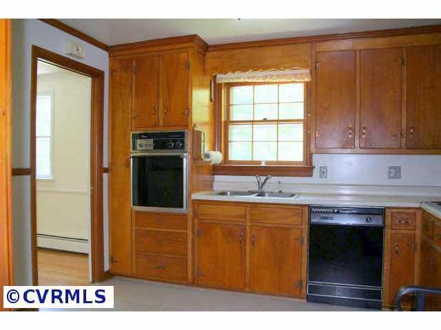 3300 Cedar Grove Road Richmond, VA 23235 - Photo 8 of 10 a kitchen with granite countertop cabinets and window
