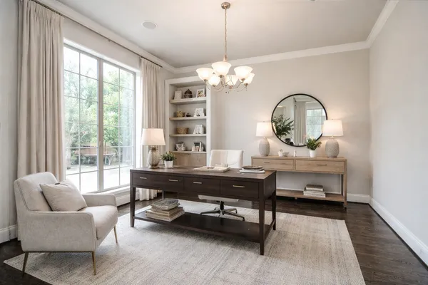 a living room with furniture a table and a large window