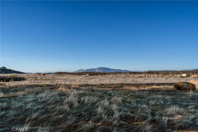 a swimming pool view with a outdoor seating