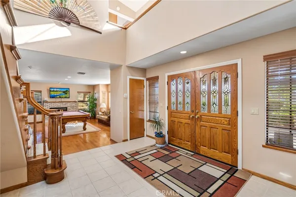a view of livingroom with furniture and a fireplace