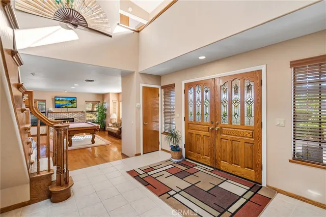 a view of livingroom with furniture and a fireplace