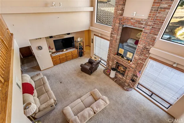 a room with furniture and view of living room