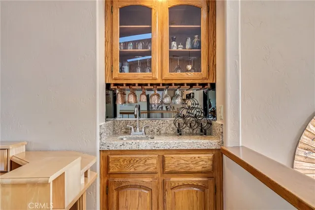 a view of a kitchen with furniture and a window