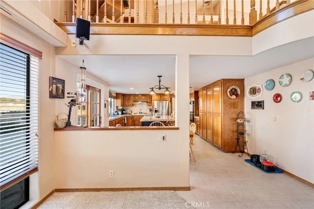 a view of a living room and balcony