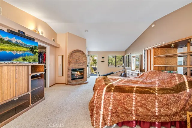 a bath tub sitting in a bathroom next to a window
