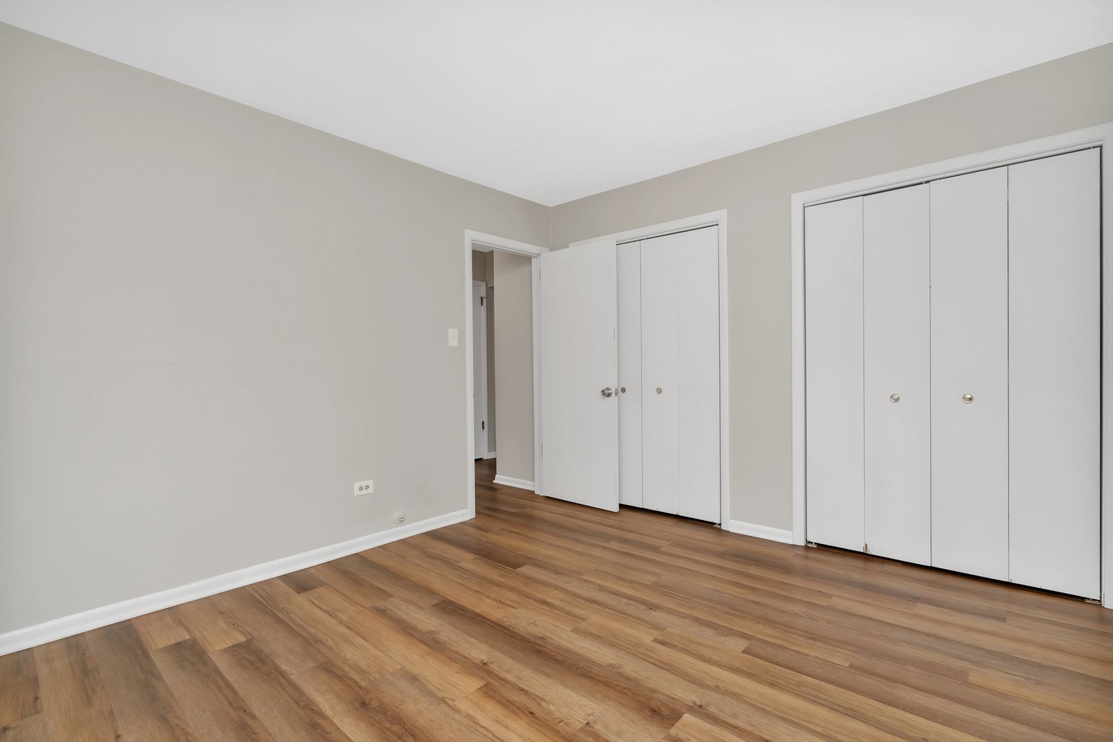 42 South Waiola Avenue, Unit 2 La Grange, IL 60525 - Photo 13 of 13 a view of an empty room with wooden floor