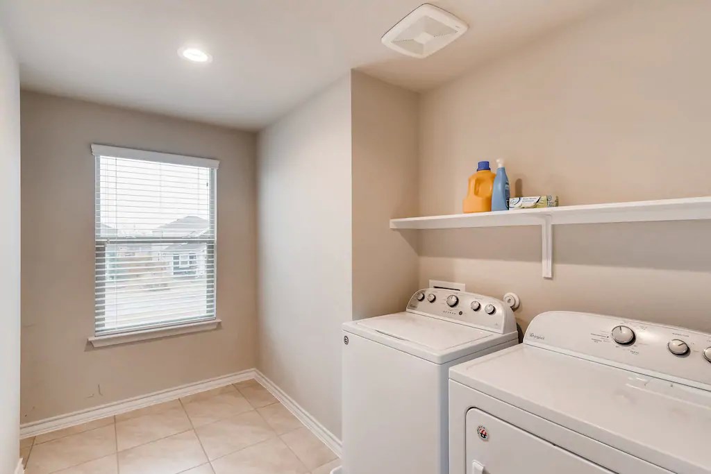 11707 Prado Ranch Boulevard Austin, TX 78725 - Photo 18 of 23 Laundry upstairs