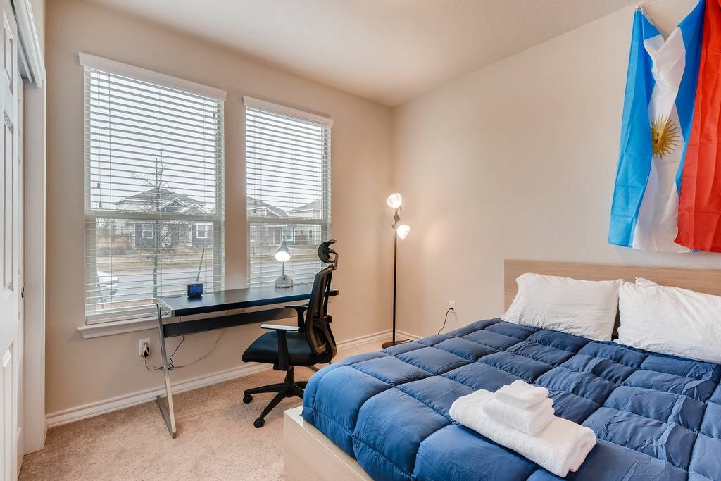 11707 Prado Ranch Boulevard Austin, TX 78725 - Photo 19 of 23 This bedroom, along with a full bath, is on the first floor