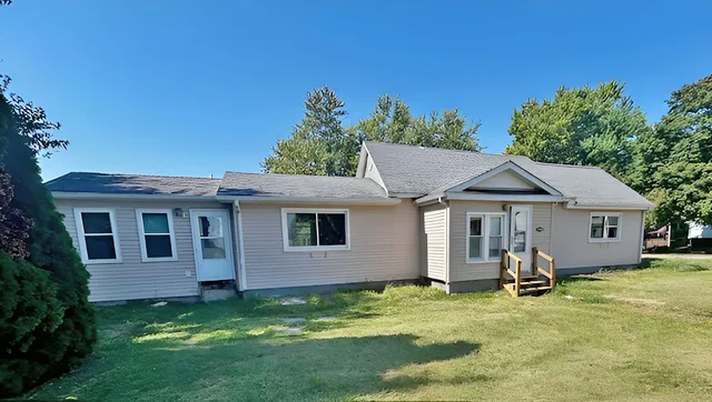 a view of a livingroom with a staircase