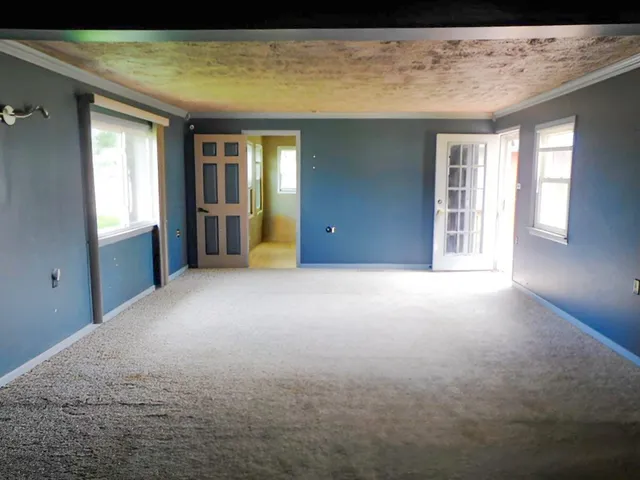 a view of a livingroom with a staircase